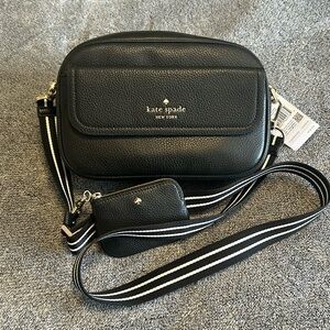 Kate spade pebble leather small flap camera bag.